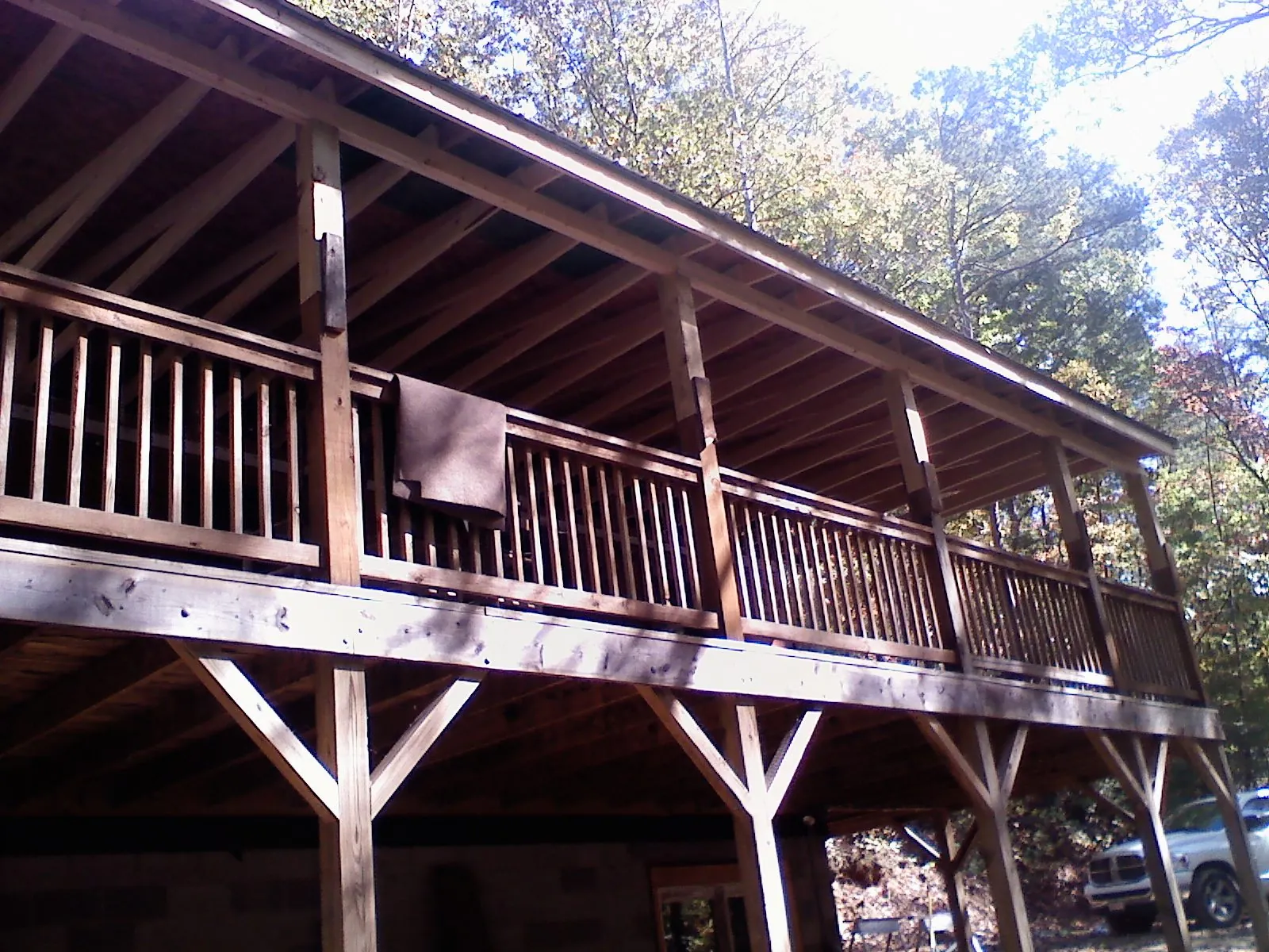 Timber framing under a new elevated porch and deck — Roof Leak Repair in San Geronimo by Roofing Brothers